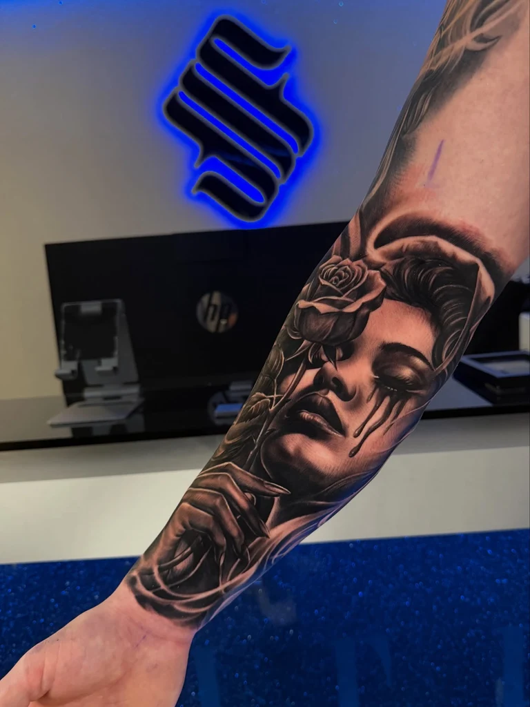 Custom black and grey tattoo by Fernie